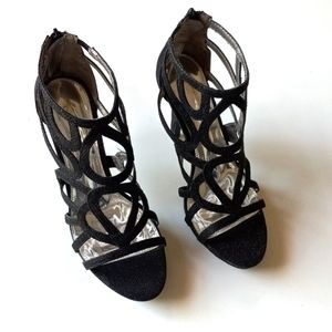 Report black stiletto heels. Size 8.5. New. Never worn.